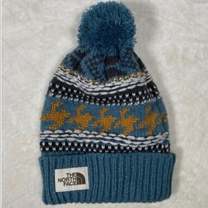 The North Face Teal and Mustard Patterned Pom Beanie
One size